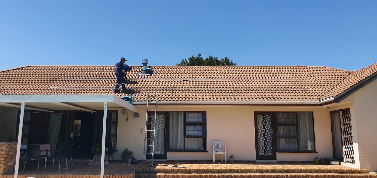 Quadron team setting up a solar installation on site