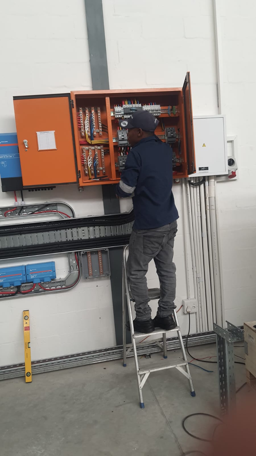 Quadron electrician working on a residential DB board in Cape Town